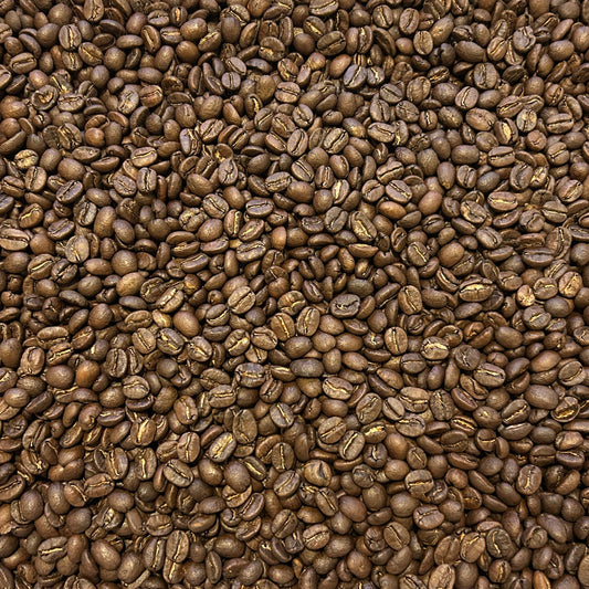 Container filled with coffee beans on a wooden surface